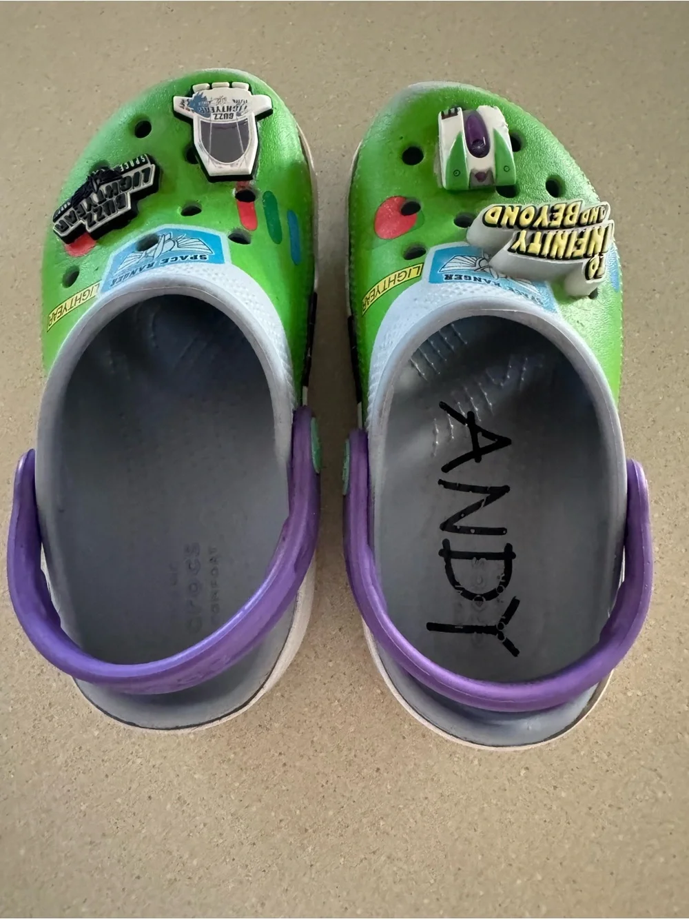 CROCS Kids Green Clogs with Purple Heel Strap and Space Charms